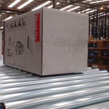 Powered warehouse roller conveyor