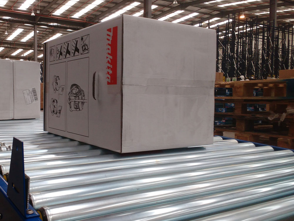 Powered warehouse roller conveyor