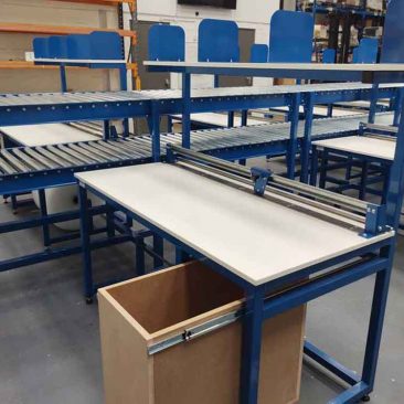 Twin tiered gravity roller conveyor