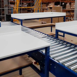 Lineshaft conveyor with packing benches