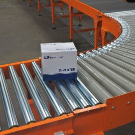 Belt to powered roller bend & gravity conveyor
